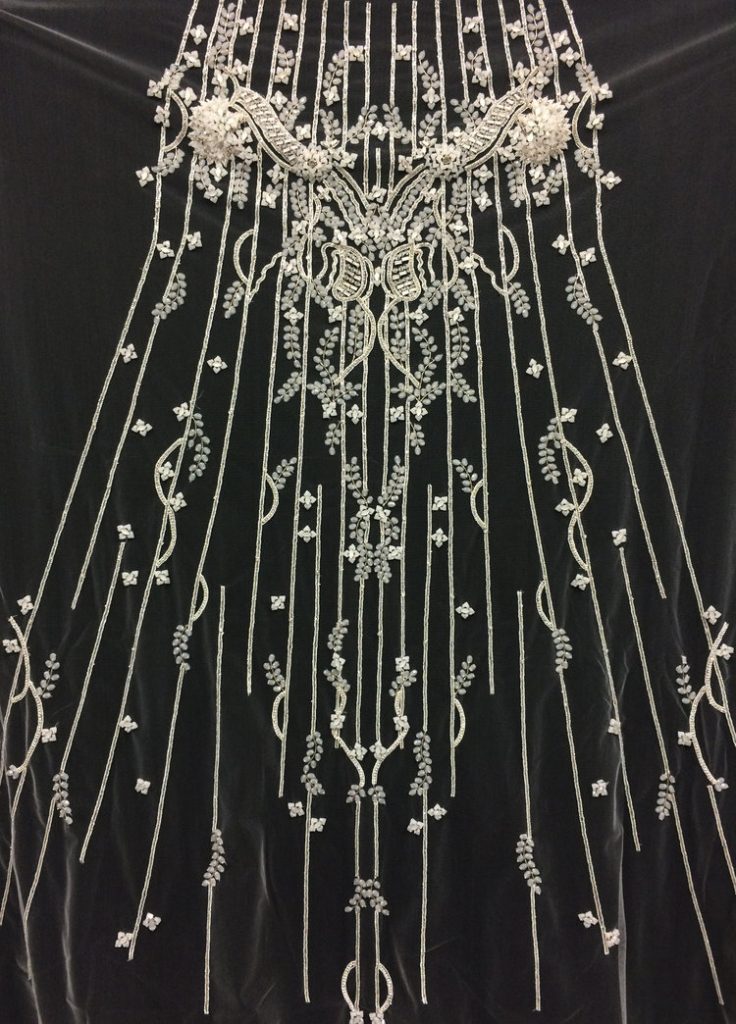 Customized hand embroidery for coututre bridal gown made to the paper pattern.