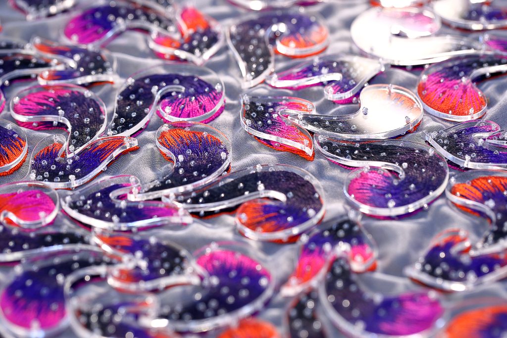 Plexiglass couture hand-beaded design